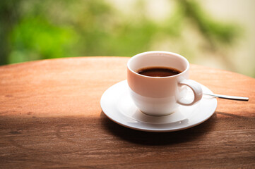 Cup of coffee on wood background. Copy space. Top view. Flat lay. Panorama