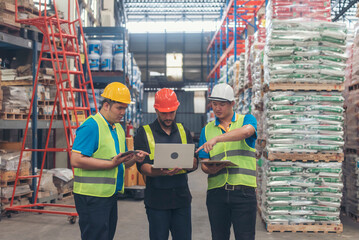 Warehouse management multiracial team partner engineer man work together checklist stock control. Warehouse worker teamwork diversity men using laptop logistics counting products store inventory.