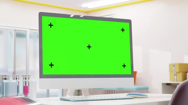 Computer MockUp. Animation, 3D Render. Empty desktop computer on work desk in laboratory or white room. Can be used in erelated to science, education, or technology. Green screen for banner and logo.