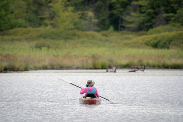 Person Kayaking in a Lake