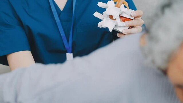 Doctor with human Pancreatitis anatomy model with Pancreas, Gallbladder, Bile Duct, Duodenum, Small intestine. Pancreatic cancer, Acute and Chronic pancreatitis, Digestive system and Health concept