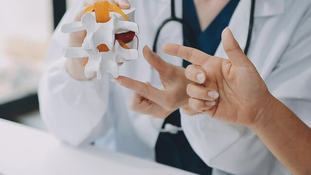 Doctor with human Pancreatitis anatomy model with Pancreas, Gallbladder, Bile Duct, Duodenum, Small intestine. Pancreatic cancer, Acute and Chronic pancreatitis, Digestive system and Health concept