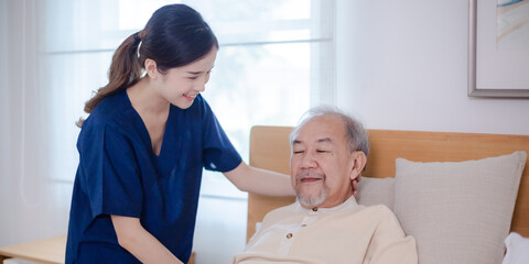 Health insurance service, Young Asian caregiver nurse examine senior man or woman patient at home....