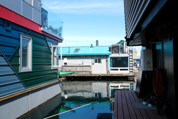 Fototapeta na wymiar Victoria British Columbia, Canada Fisherman's wharf House Boat Homes float on Vancouver Island BC Boats and Yachts at Fisherman's Wharf Marina in the Inner Harbour