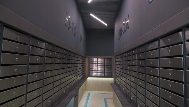 Flying past mailboxes in the entrance of a multi-story building
