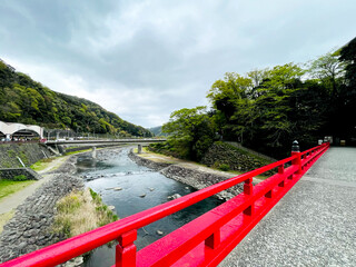 Landscape of red bridge and river at Odawara bus stop. Transition point to Hakone, Japan - 762083364