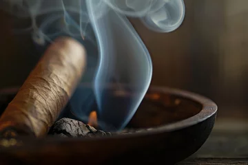 Zelfklevend Fotobehang Cigar in a wooden bowl with smoke on a dark background,close up © Dina