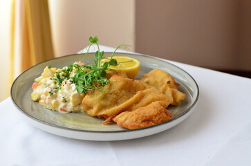 traditional Czech food, fried pork steak, close-up view, served on a plate