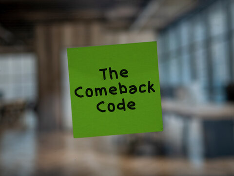 Post note on glass with 'The Comeback Code'.