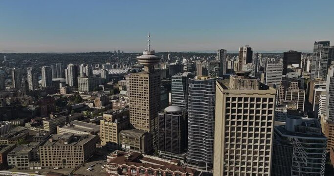 Vancouver BC Canada Aerial v97 drone flyover waterfront railway station capturing downtown and coal harbour cityscape, views of marina and Stanley Park - Shot with Mavic 3 Pro Cine - July 2023
