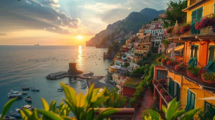 Gordijnen The sun sets over calm waters, casting a warm golden glow on the charming houses lining the shore in a picturesque European summer scene in Italy © Fokke Baarssen
