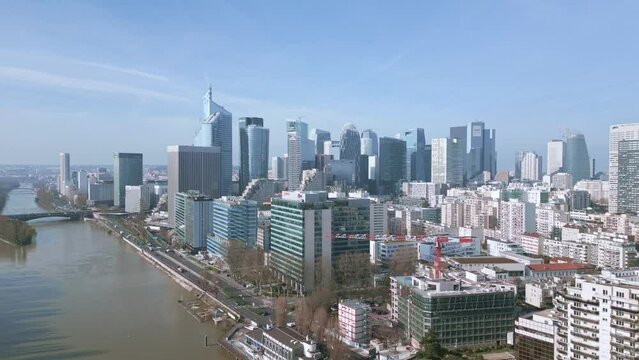 La Defense neighborhood riverside, Paris in France. Aerial drone panoramic view and sky for copy space
