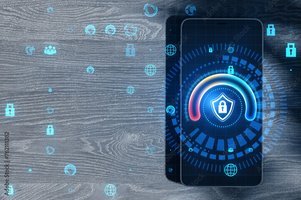 Poster close up of smartphone with glowing round padlock shield hologram on wooden desk background. digital