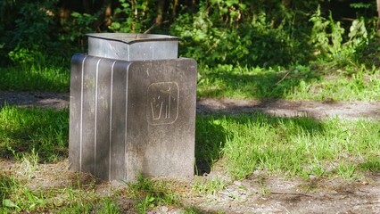 Public Metal Trashcan in City Park