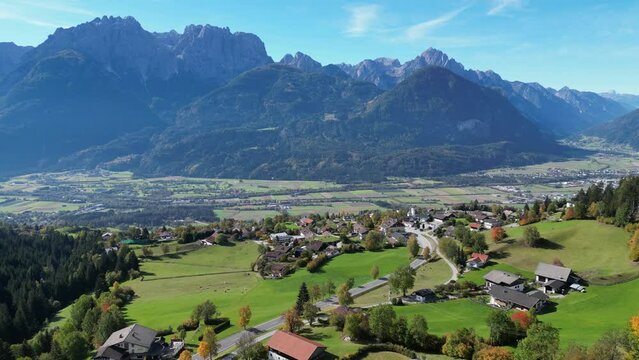 Gaital Alps and Small Mountain Village near Lienz in Tyrol, Austria - Aerial 4k