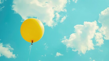 Yellow happy balloon with text copy space on a background of a blue sky. Concept for birthday greeting card with happy sentiments,Balloons in the sky with filter effect retro vintage style
 - obrazy, fototapety, plakaty