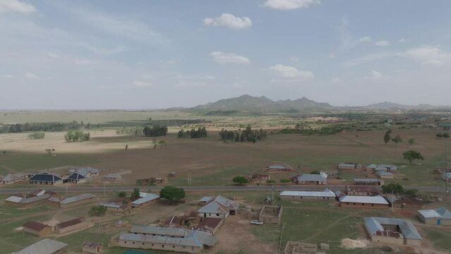 Aerial - Descending drone shot over scenic Kassa town in Plateau, Nigeria