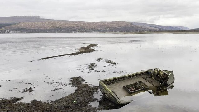 Dramatic shipwreck on the shores of Loch Eil in Fort William, Scotland