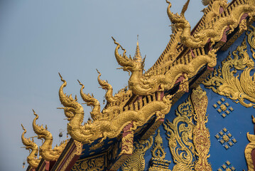 Fototapeta na wymiar Wat Rong Suea Ten or The Blue Temple is the most famous landmark, Chiang Rai, Thailand 