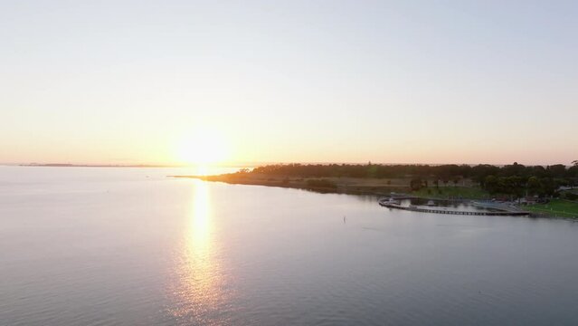 AERIAL Dolly Back Of Geelong Yacht Club and Moorings At Sunrise