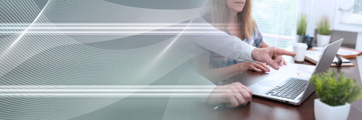 Two business people working together; panoramic banner