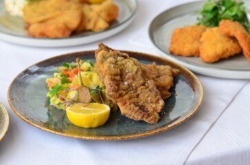 view of served veal steak from liver, Czech traditional food, restaurant background, close-up view