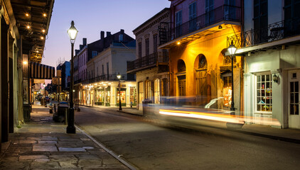 Fototapeta na wymiar New Orleans street in French Quarter at dusk