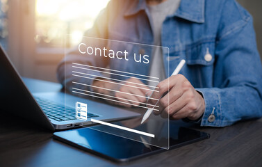Communication and Contact us or Customer support hotline people connect. Hand using a laptop and...