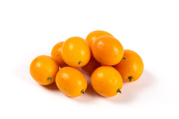 ripe cumquat or kumquat fruit isolated on white background