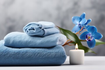 Spa composition with soft towels and a beautiful orchid