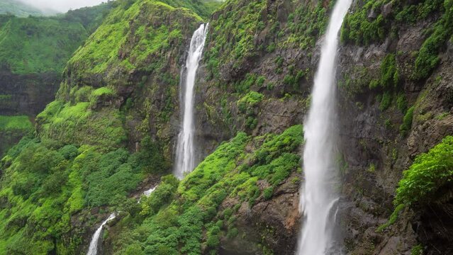 Timelapse - Two waterfalls in one frame in a mountain 4K60