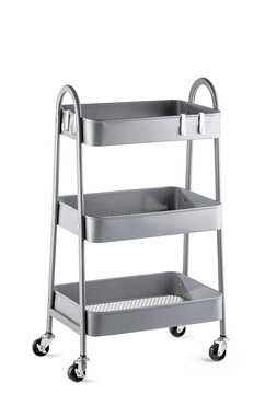 Three tier metal storage trolley with baskets isolated on white