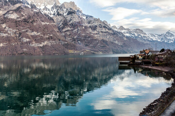Mountain Majesty: Reflective Serenity on the Lakeside