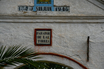Centenary old Parador with a religious ceramic plaque in Andalusia, Spain