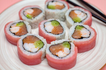 White Plate With Sushi and Chopsticks