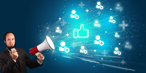 Young person with megaphone and social networking icon