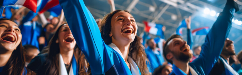French football soccer fans in a stadium supporting the national team, Equipe tricolore
