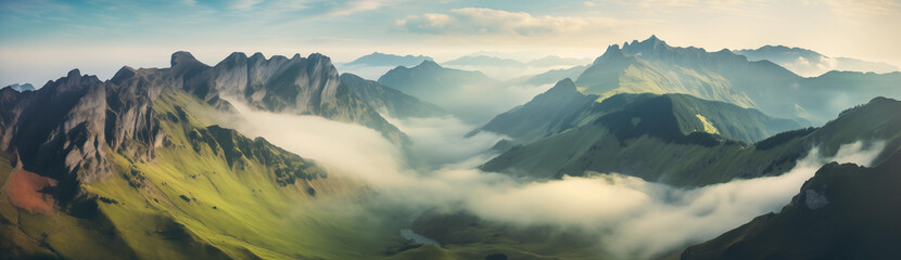 Breathtaking Panorama of Verdant Valleys, Mist-laden Clouds, and Towering Peaks, Offering a Serene...