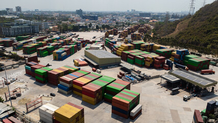 Warehouse, container goods at port cargo by the sea, Business and transporttation industry, by trailer and ship to distribute products to consumers and companies worldwide,