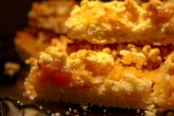 Sweet dough apple pie preparation in the kitchen close up view