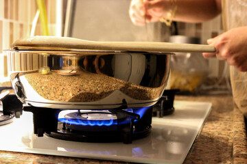 Food preparation on on the oven stove close up view