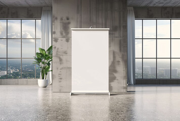 a mockup of an empty white roll-up banner in the corner of a modern office with terrazzo flooring and large windows the background has a neutral color palette
