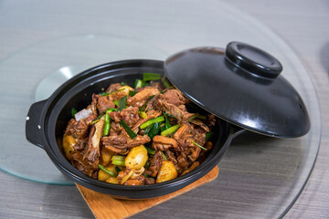 A pot of delicious braised duck with water chestnuts, home cooking