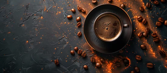 Gartenposter cup of black coffee surrounded by coffee beans on rustic black background  © Menganga