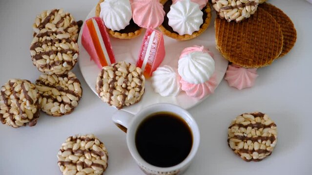 Luxury handmade chocolate mendiants, cookies, bites, candies, marmalade, chocolate baskets, marshmallow, wheat grain rice crackers