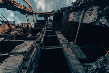 destroyed and burned houses in the city during the war in Ukraine