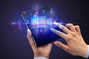 Businessman holding a foldable smartphone