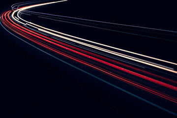 lights of cars driving at night. long exposure