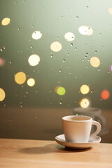 A relaxing time watching the rain outside the window.