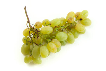 Bunch of organic green grapes isolated on white background.
